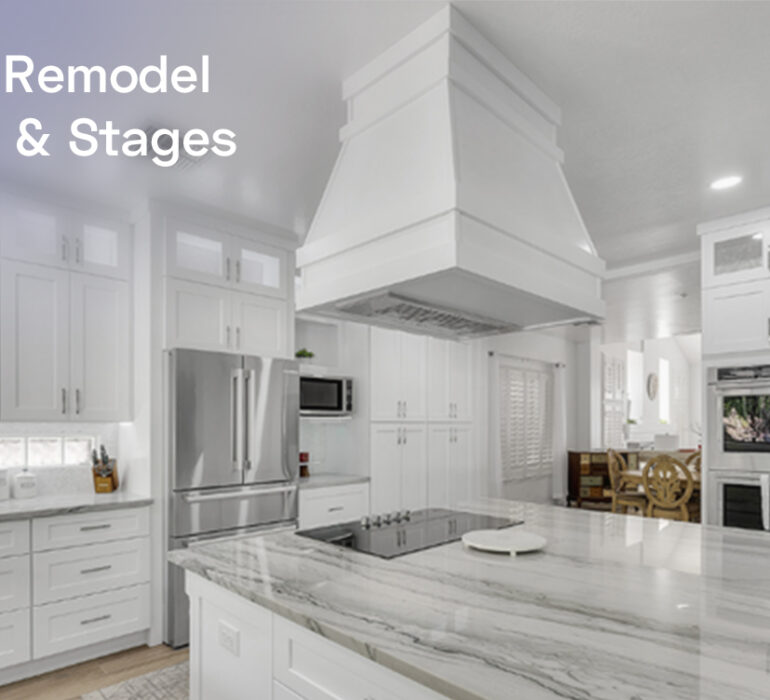 Modern white kitchen with marble countertops, stainless steel appliances, and elegant cabinetry, illustrating the remodeling timeline and process.